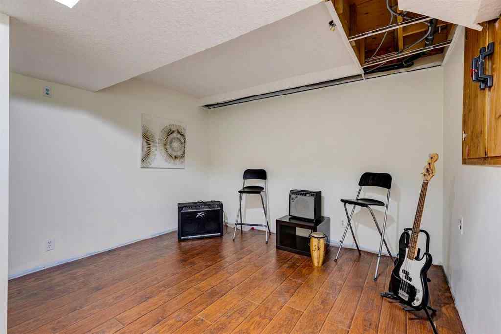 MLS® A2254201 - 263025 16 Street W in DeWinton Heights Rural Foothills County, Residential