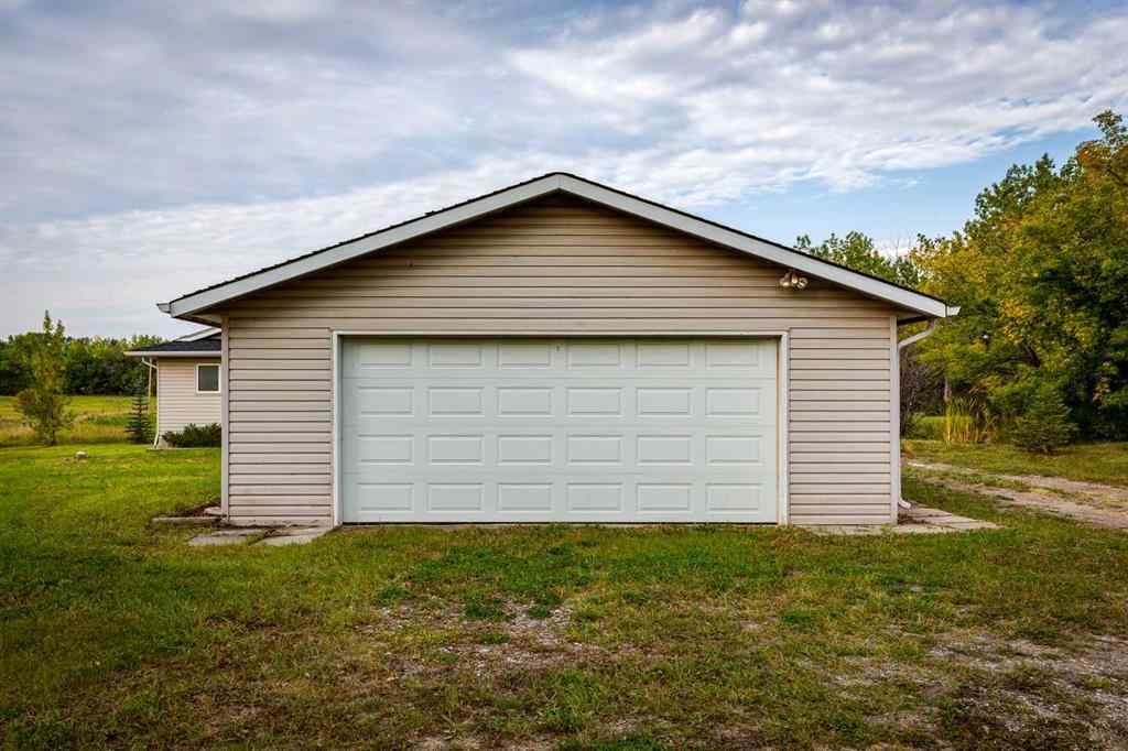 MLS® A2254201 - 263025 16 Street W in DeWinton Heights Rural Foothills County, Residential