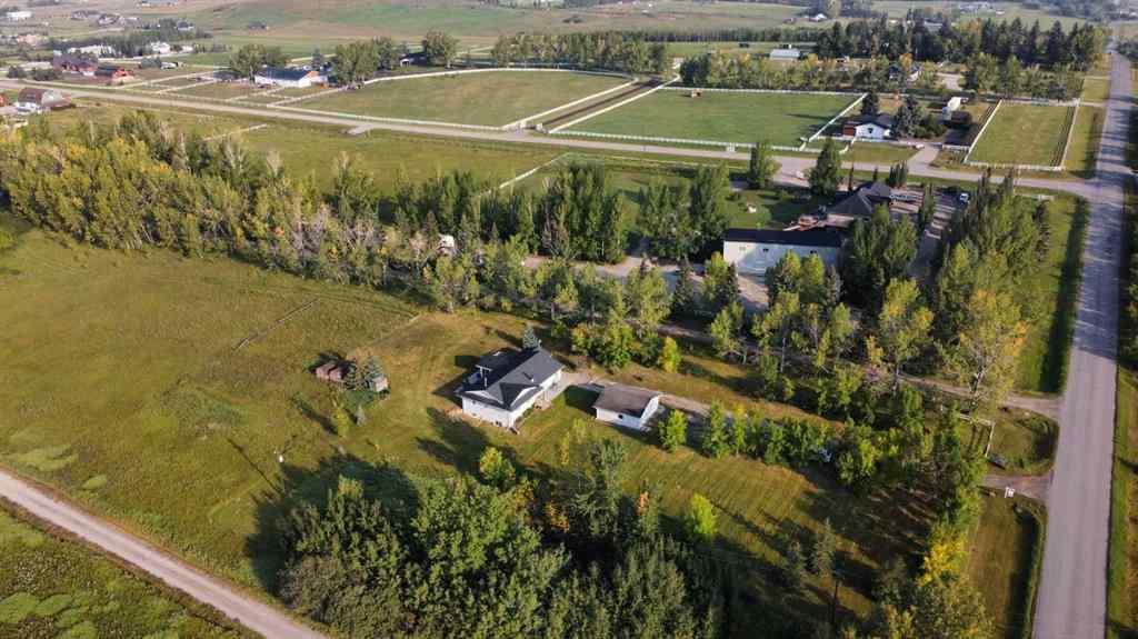 MLS® A2254201 - 263025 16 Street W in DeWinton Heights Rural Foothills County, Residential