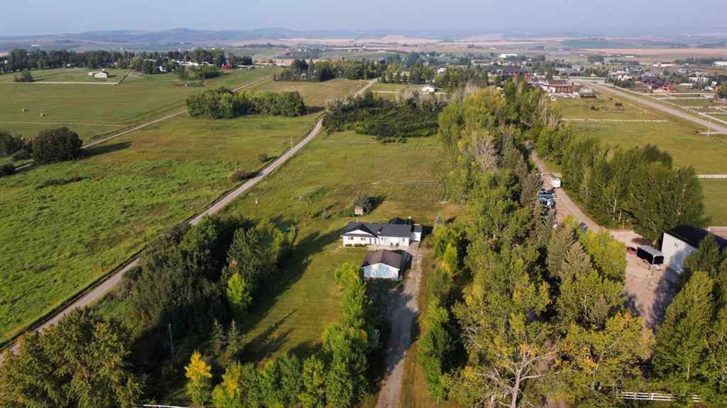 MLS® A2254201 - 263025 16 Street W in DeWinton Heights Rural Foothills County, Residential