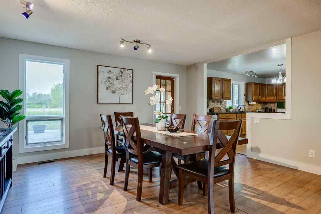 MLS® A2254201 - 263025 16 Street W in DeWinton Heights Rural Foothills County, Residential