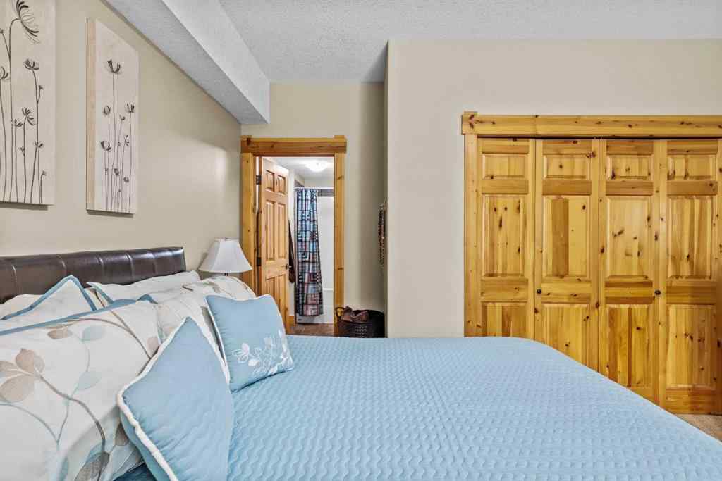 MLS® A2254210 - Unit #204 175 Crossbow Place SW in Three Sisters Canmore, Residential