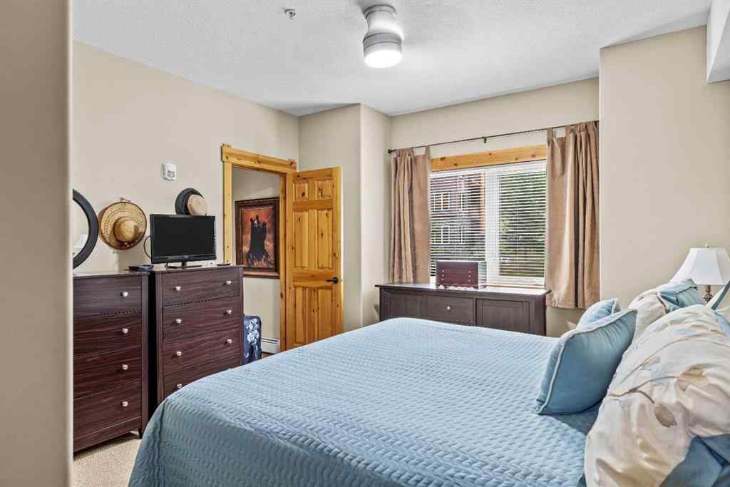 MLS® A2254210 - Unit #204 175 Crossbow Place SW in Three Sisters Canmore, Residential