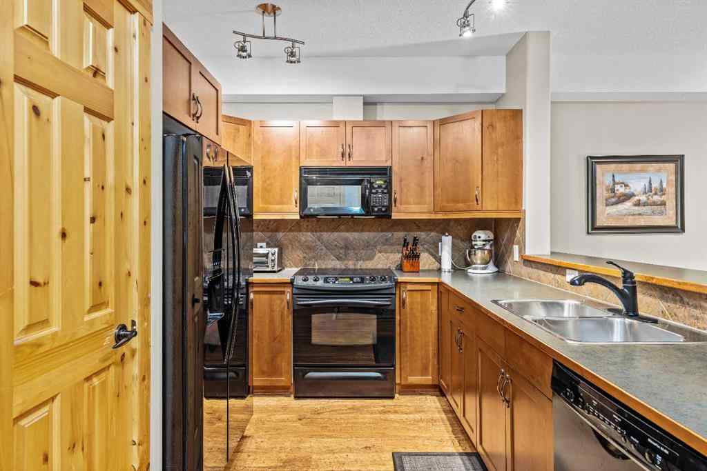 MLS® A2254210 - Unit #204 175 Crossbow Place SW in Three Sisters Canmore, Residential