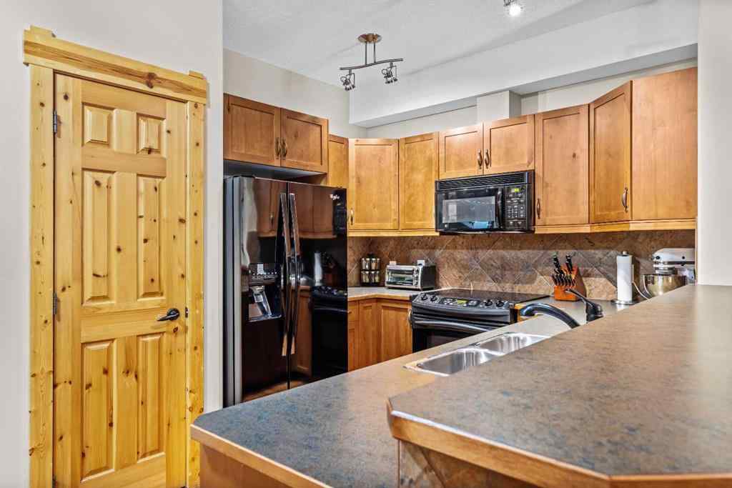 MLS® A2254210 - Unit #204 175 Crossbow Place SW in Three Sisters Canmore, Residential