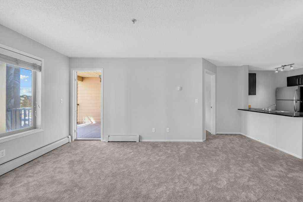 MLS® A2254233 - Unit #204 5 Saddlestone Way NE in Saddle Ridge Calgary, Residential