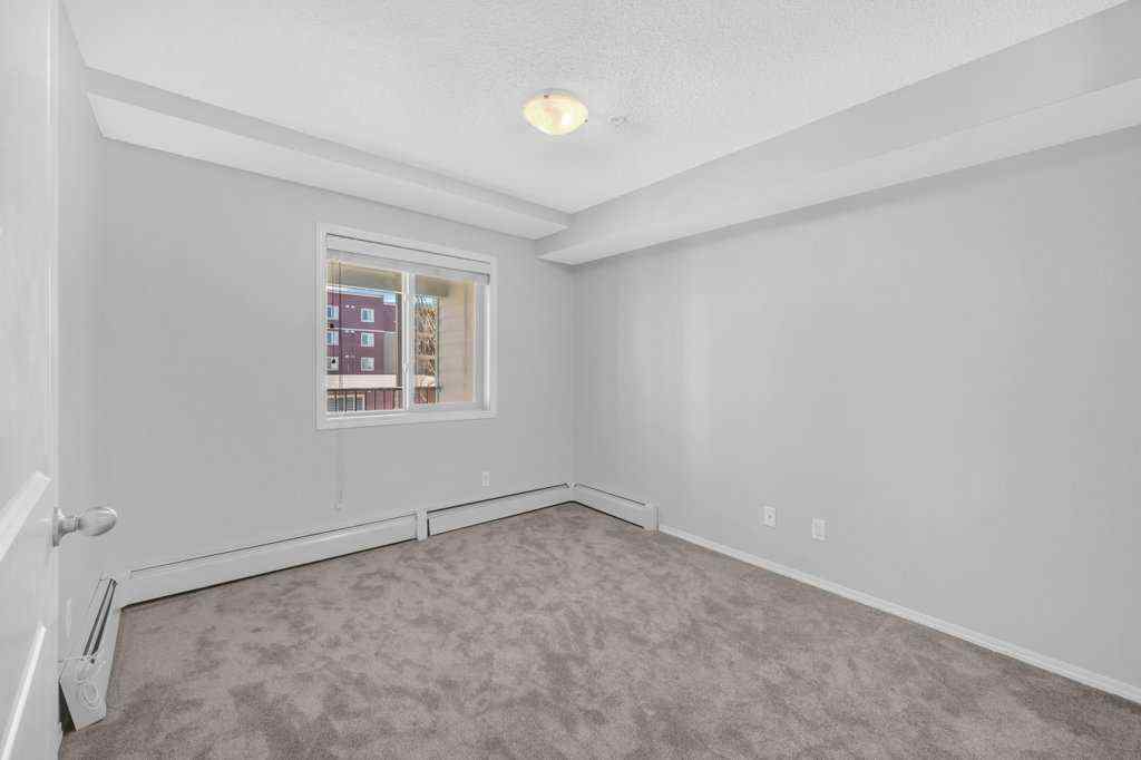 MLS® A2254233 - Unit #204 5 Saddlestone Way NE in Saddle Ridge Calgary, Residential