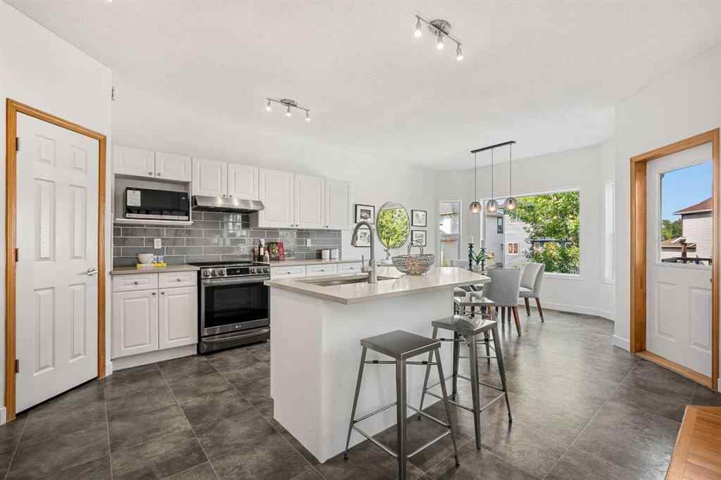 MLS® A2254265 - 335 Hidden Valley Grove NW in Hidden Valley Calgary, Residential