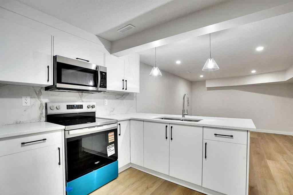 MLS® A2254269 - 903B Queensland Drive SE in Queensland Calgary, Residential