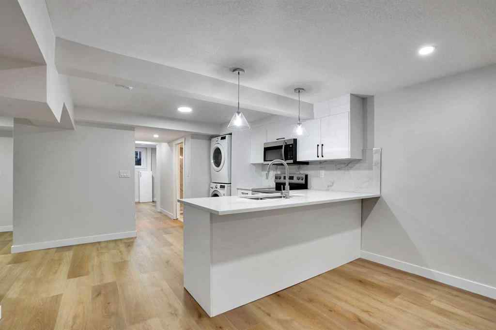 MLS® A2254269 - 903B Queensland Drive SE in Queensland Calgary, Residential