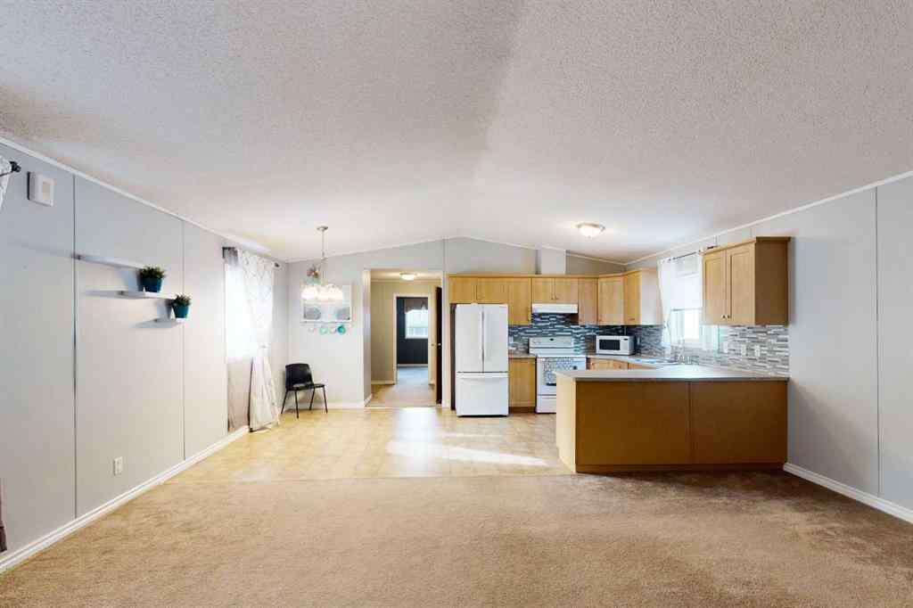 MLS® A2254289 - 209 Gregoire Crescent  in Gregoire Park Fort McMurray, Residential