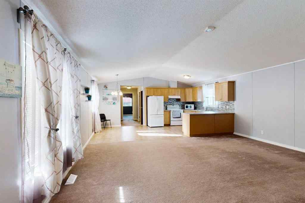 MLS® A2254289 - 209 Gregoire Crescent  in Gregoire Park Fort McMurray, Residential
