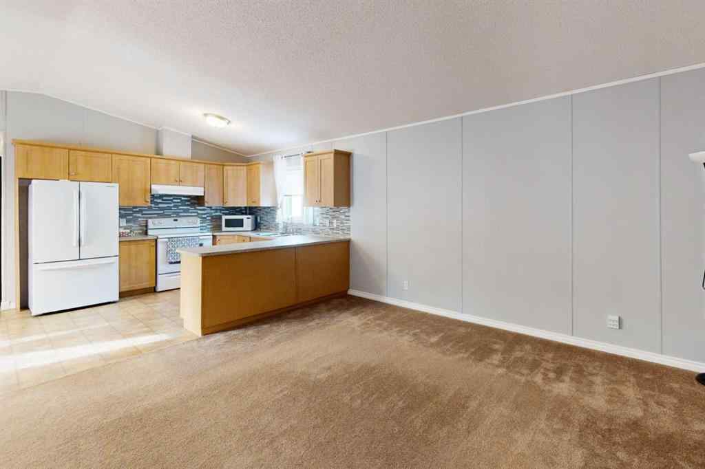 MLS® A2254289 - 209 Gregoire Crescent  in Gregoire Park Fort McMurray, Residential