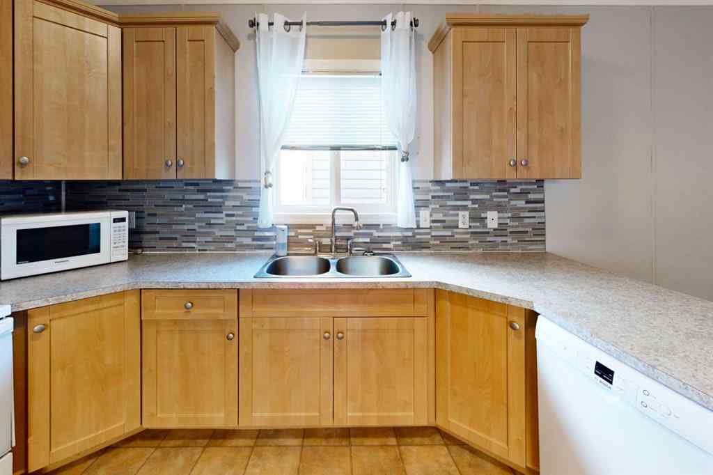 MLS® A2254289 - 209 Gregoire Crescent  in Gregoire Park Fort McMurray, Residential