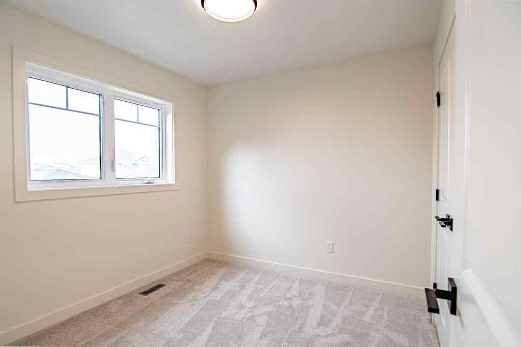 MLS® A2254310 - 202 Livingston Close  in Laredo Red Deer, Residential