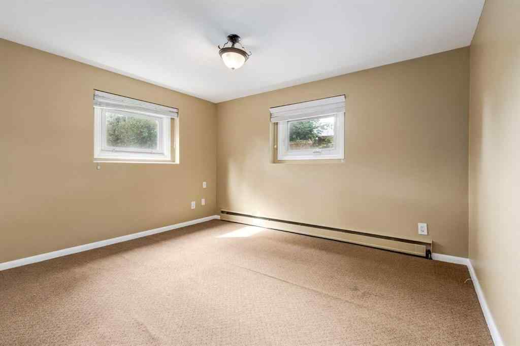MLS® A2254311 - 911 80 Avenue SW in Chinook Park Calgary, Residential