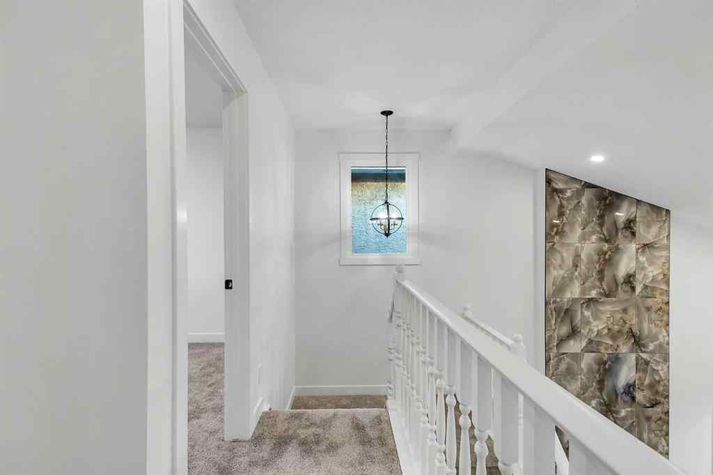 MLS® A2254320 - 119 Macewan Glen Way NW in MacEwan Glen Calgary, Residential