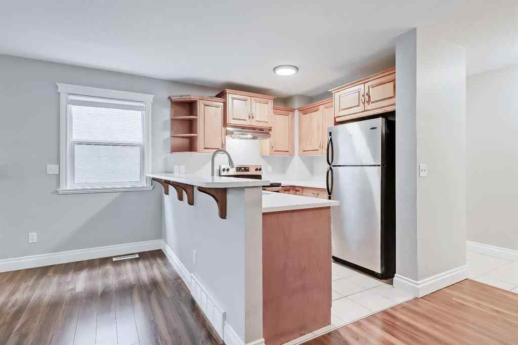 MLS® A2254331 - Unit #1 512 56 Avenue SW in Windsor Park Calgary, Residential