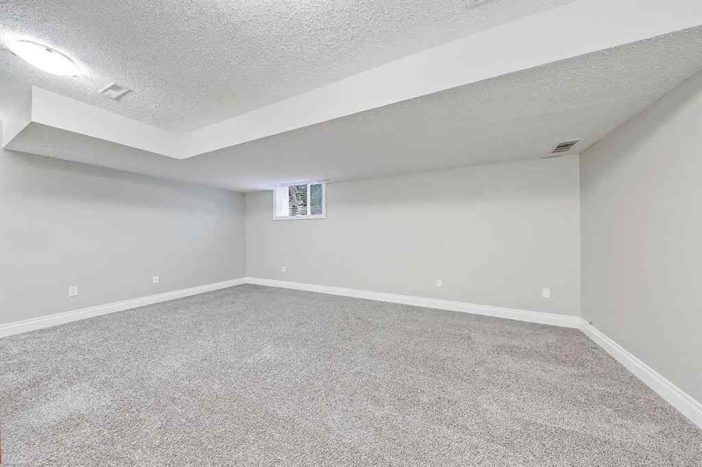 MLS® A2254331 - Unit #1 512 56 Avenue SW in Windsor Park Calgary, Residential