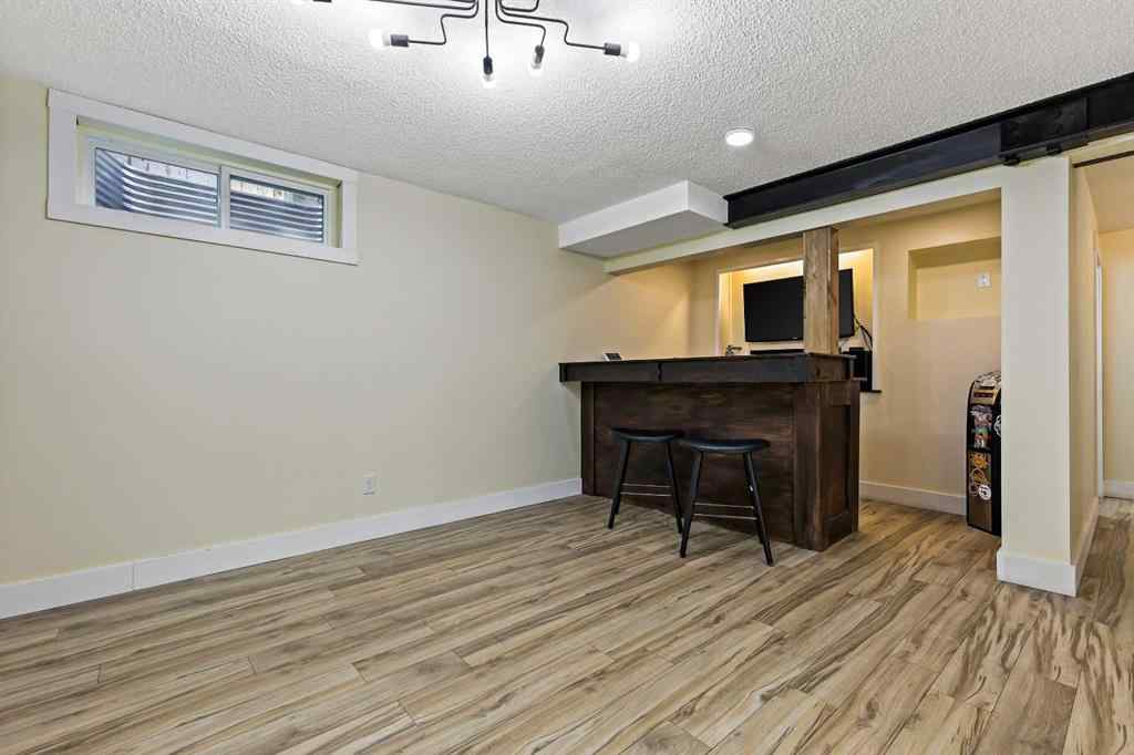 MLS® A2254349 - 24 Westridge Drive SW in Westridge Okotoks, Residential
