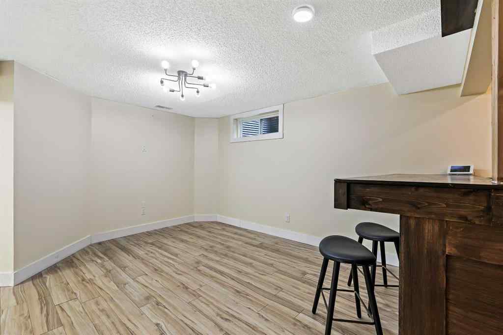 MLS® A2254349 - 24 Westridge Drive SW in Westridge Okotoks, Residential