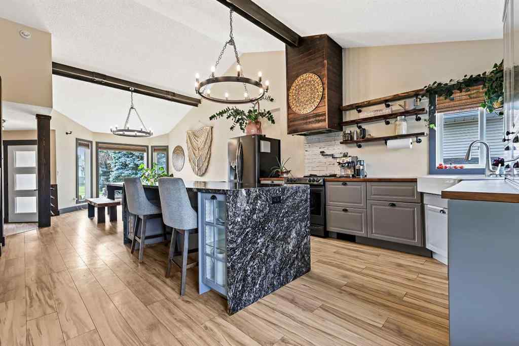 MLS® A2254349 - 24 Westridge Drive SW in Westridge Okotoks, Residential