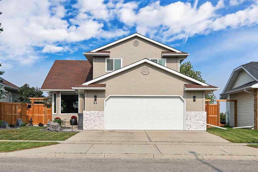 MLS® A2254349 - 24 Westridge Drive SW in Westridge Okotoks, Residential