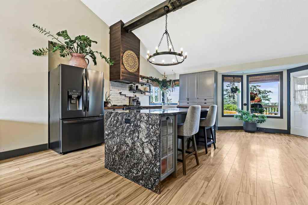 MLS® A2254349 - 24 Westridge Drive SW in Westridge Okotoks, Residential