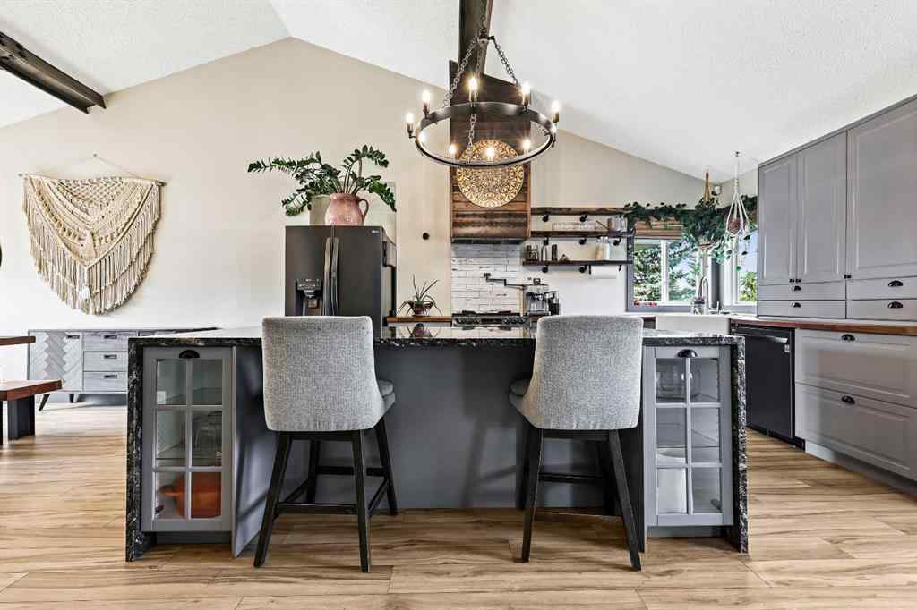 MLS® A2254349 - 24 Westridge Drive SW in Westridge Okotoks, Residential