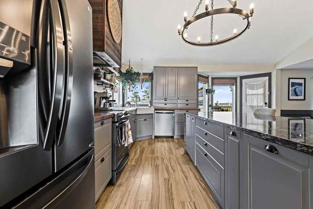 MLS® A2254349 - 24 Westridge Drive SW in Westridge Okotoks, Residential