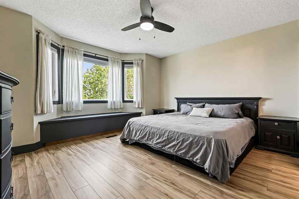 MLS® A2254349 - 24 Westridge Drive SW in Westridge Okotoks, Residential