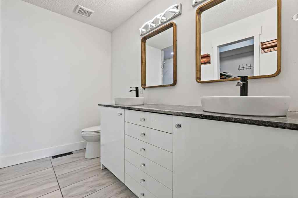 MLS® A2254349 - 24 Westridge Drive SW in Westridge Okotoks, Residential