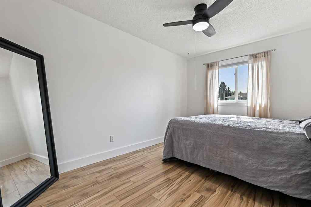 MLS® A2254349 - 24 Westridge Drive SW in Westridge Okotoks, Residential