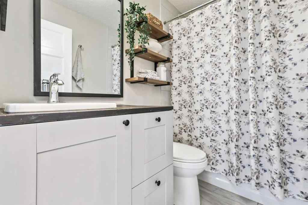 MLS® A2254349 - 24 Westridge Drive SW in Westridge Okotoks, Residential
