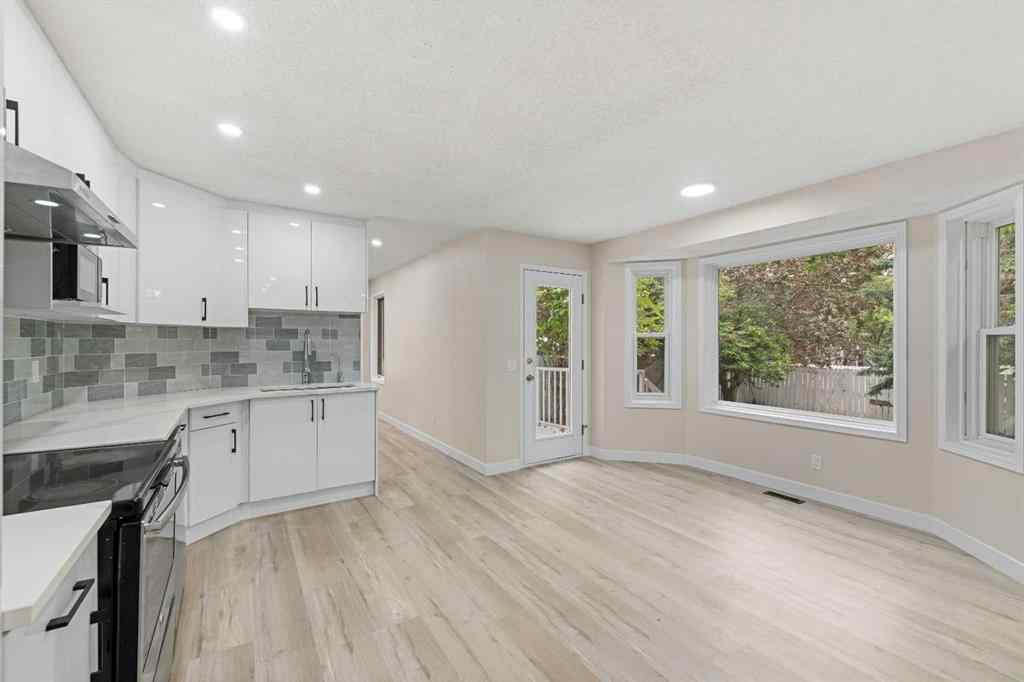 MLS® A2254378 - 148 Harvest Wood Way NE in Harvest Hills Calgary, Residential