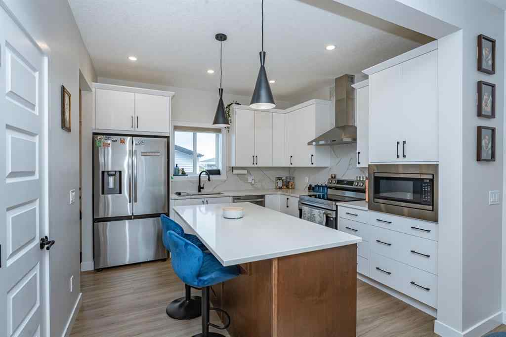 MLS® A2254390 - 52 Lewiston Drive NE in Lewisburg Calgary, Residential