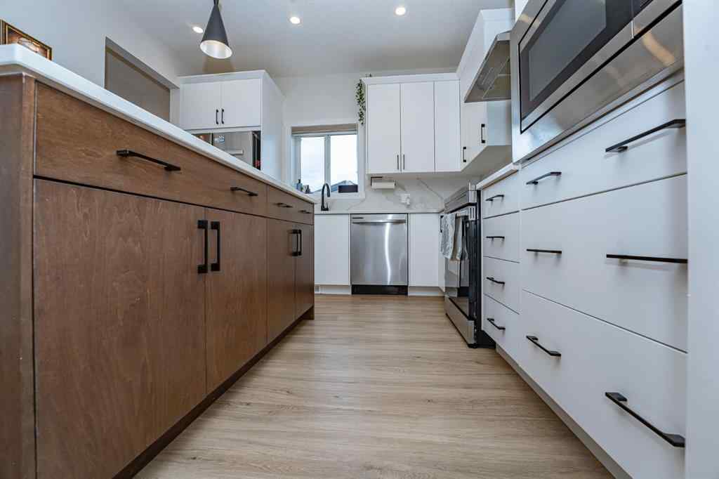 MLS® A2254390 - 52 Lewiston Drive NE in Lewisburg Calgary, Residential