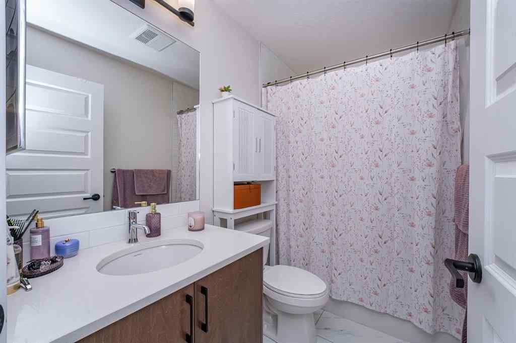 MLS® A2254390 - 52 Lewiston Drive NE in Lewisburg Calgary, Residential
