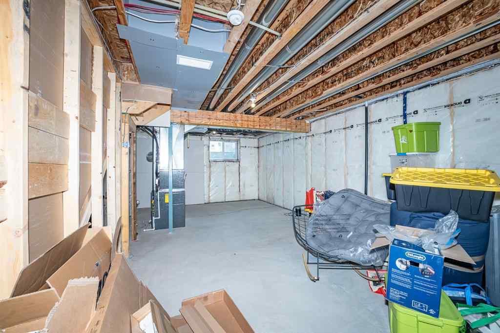 MLS® A2254390 - 52 Lewiston Drive NE in Lewisburg Calgary, Residential