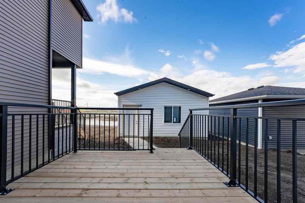 MLS® A2254390 - 52 Lewiston Drive NE in Lewisburg Calgary, Residential