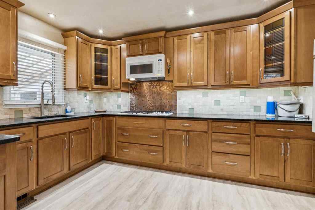 MLS® A2254409 - 219 Pinemill Road NE in Pineridge Calgary, Residential