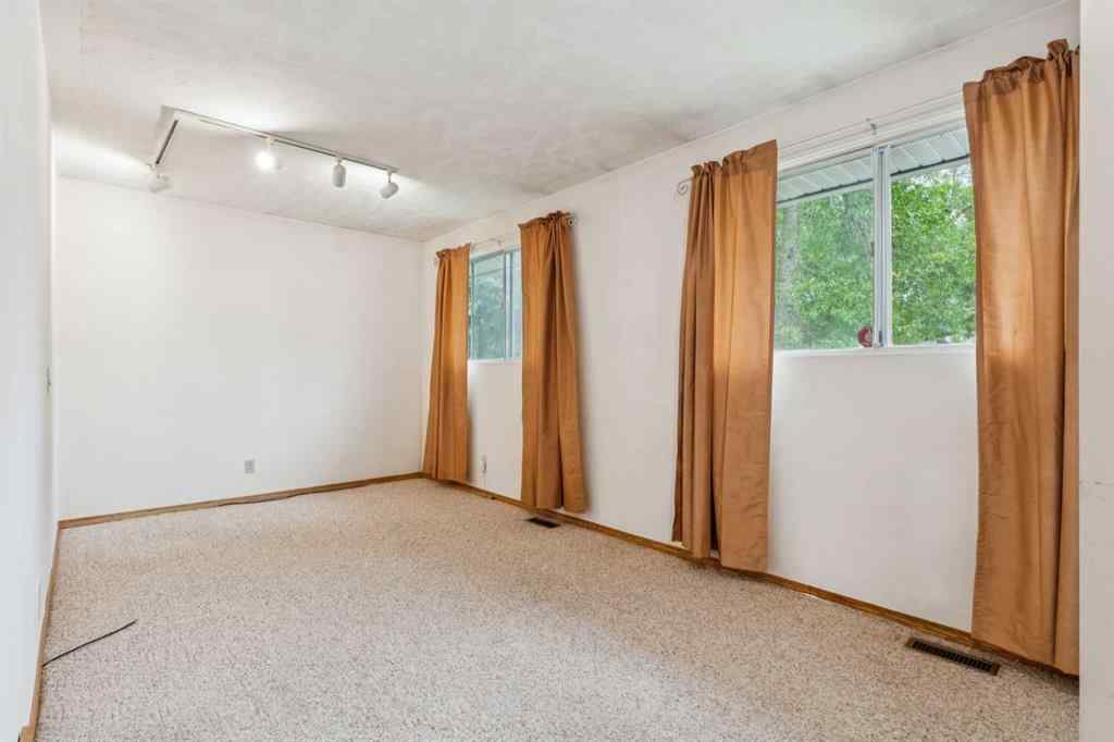 MLS® A2254409 - 219 Pinemill Road NE in Pineridge Calgary, Residential
