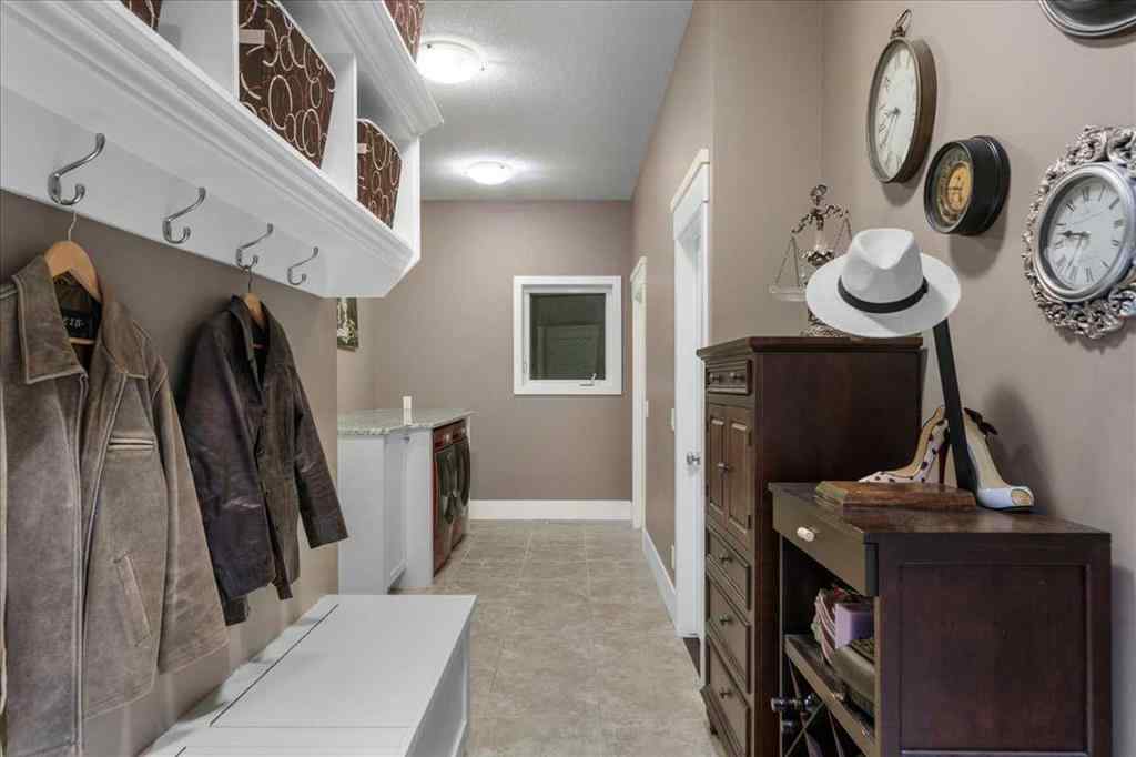 MLS® A2254423 - 314 Hawk's Nest Hollow  in Hawks Landing Priddis Greens, Residential