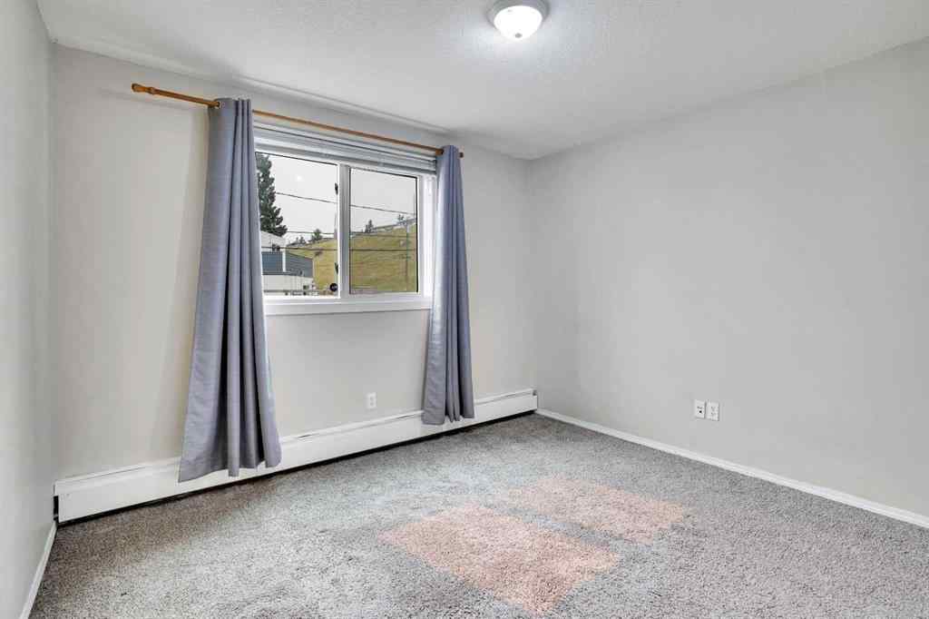 MLS® A2254426 - Unit #103 219 Huntington Park Bay NW in Huntington Hills Calgary, Residential