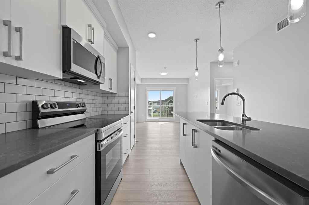 MLS® A2254441 - Unit #209 40 carrington Plaza NW in Carrington Calgary, Residential