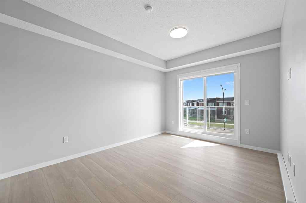 MLS® A2254441 - Unit #209 40 carrington Plaza NW in Carrington Calgary, Residential