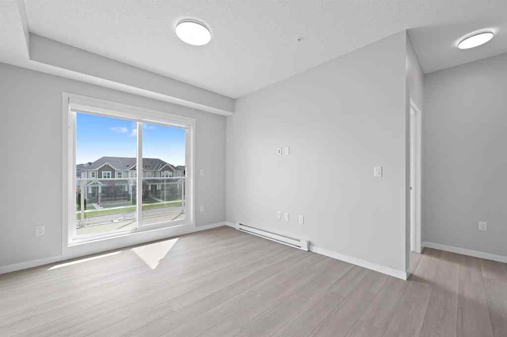 MLS® A2254441 - Unit #209 40 carrington Plaza NW in Carrington Calgary, Residential