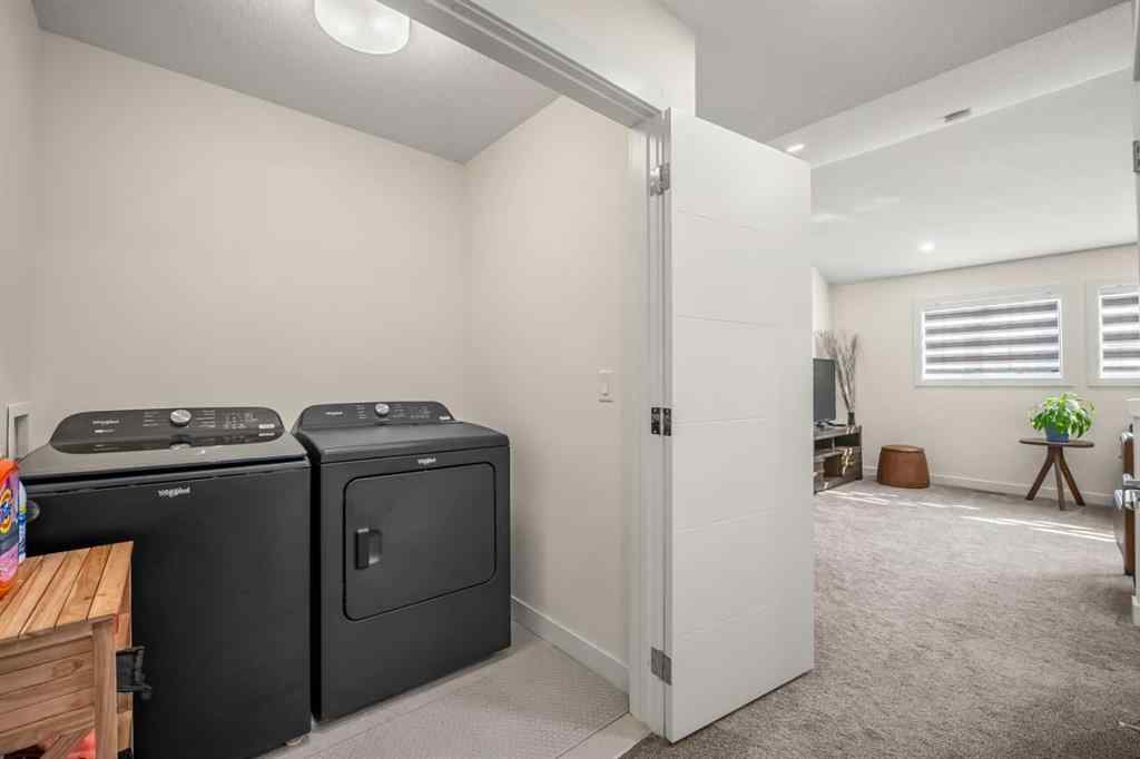 MLS® A2254453 - Unit #203 201 Cooperswood Green SW in Coopers Crossing Airdrie, Residential