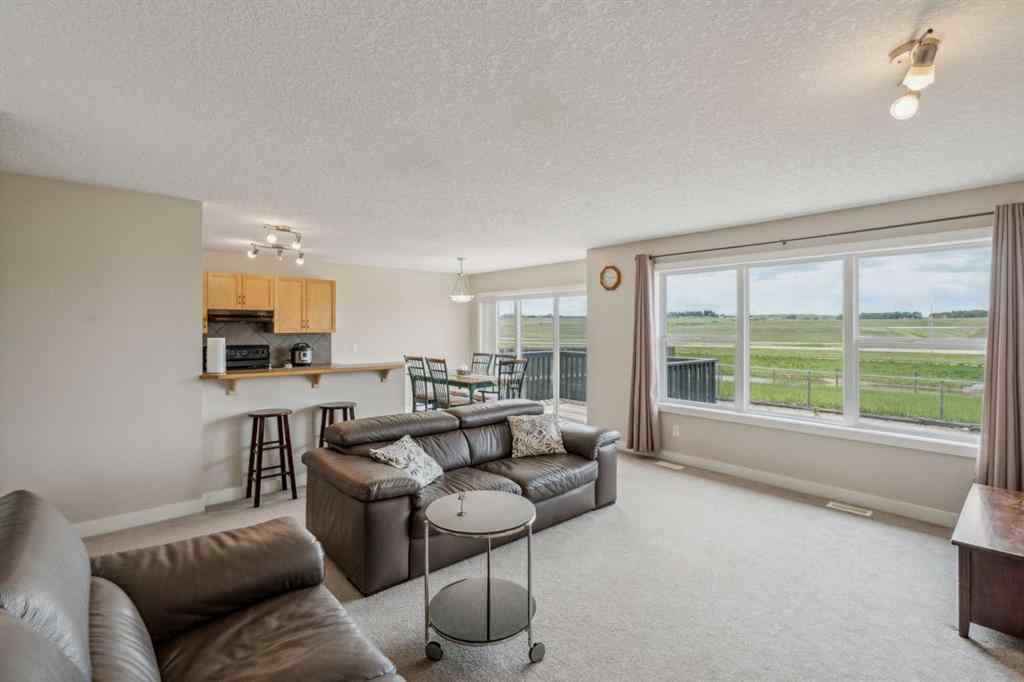 MLS® A2254475 - 91 Bridlecrest Street SW in Bridlewood Calgary, Residential