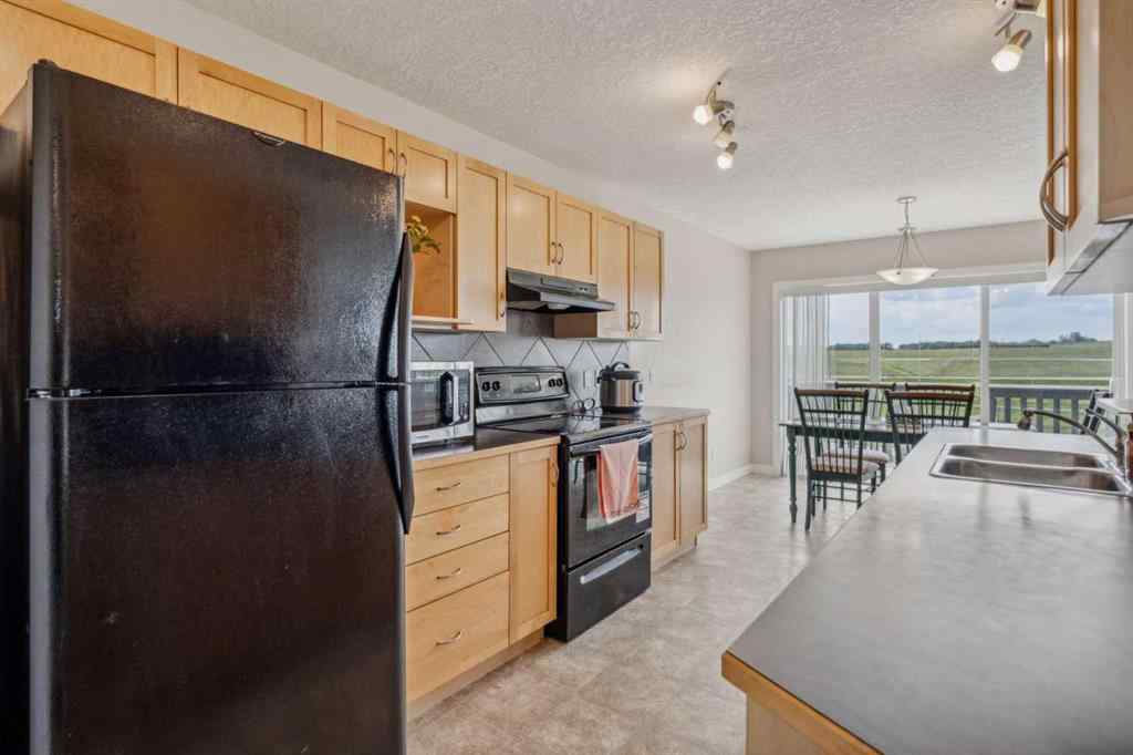 MLS® A2254475 - 91 Bridlecrest Street SW in Bridlewood Calgary, Residential